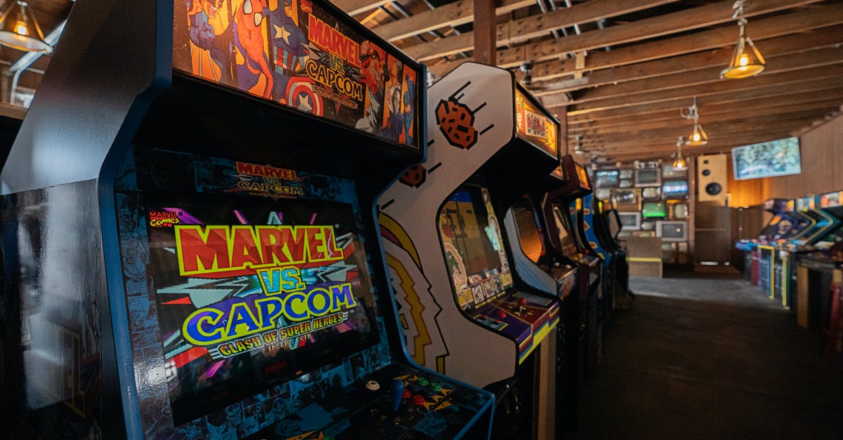 Is there a standardized rating system for game difficulty? - Arcade machines with colorful monitors in entertainment club Is there a standardized rating system for game difficulty? - Arcade machines with colorful monitors in entertainment club