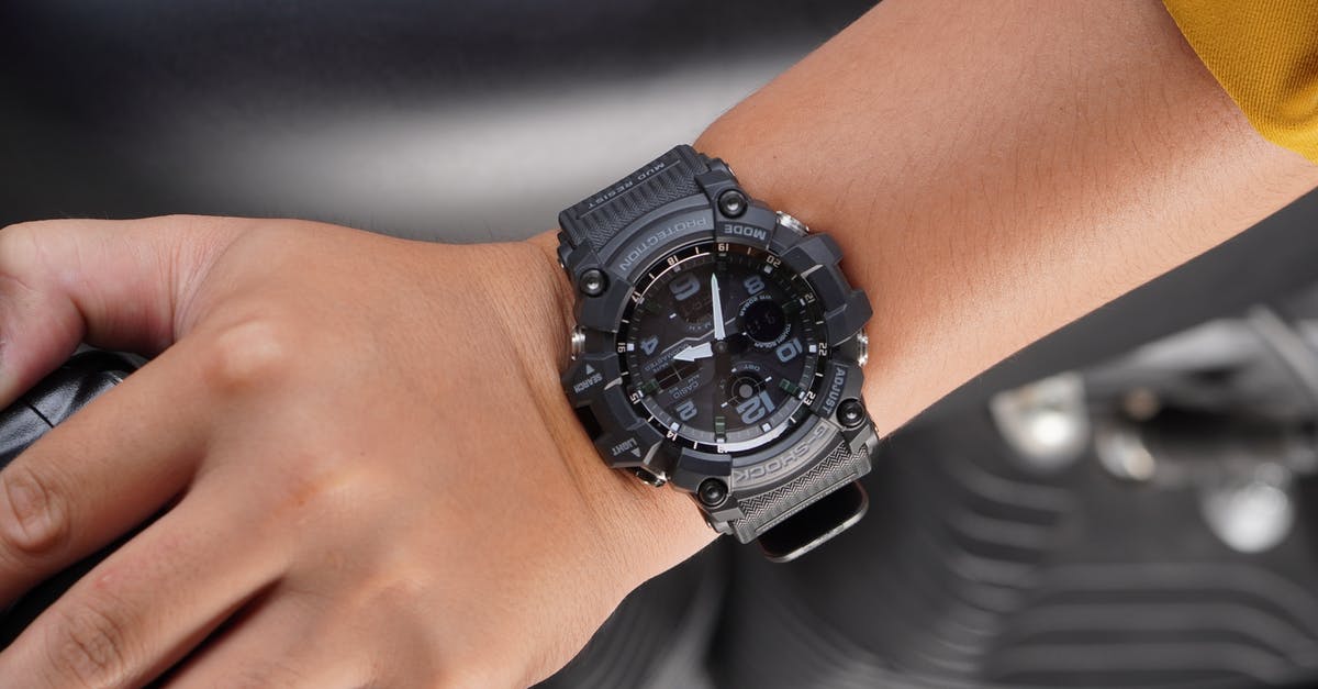 Is there a time limit in Overwatch? - Person Wearing Black and Silver Chronograph Watch