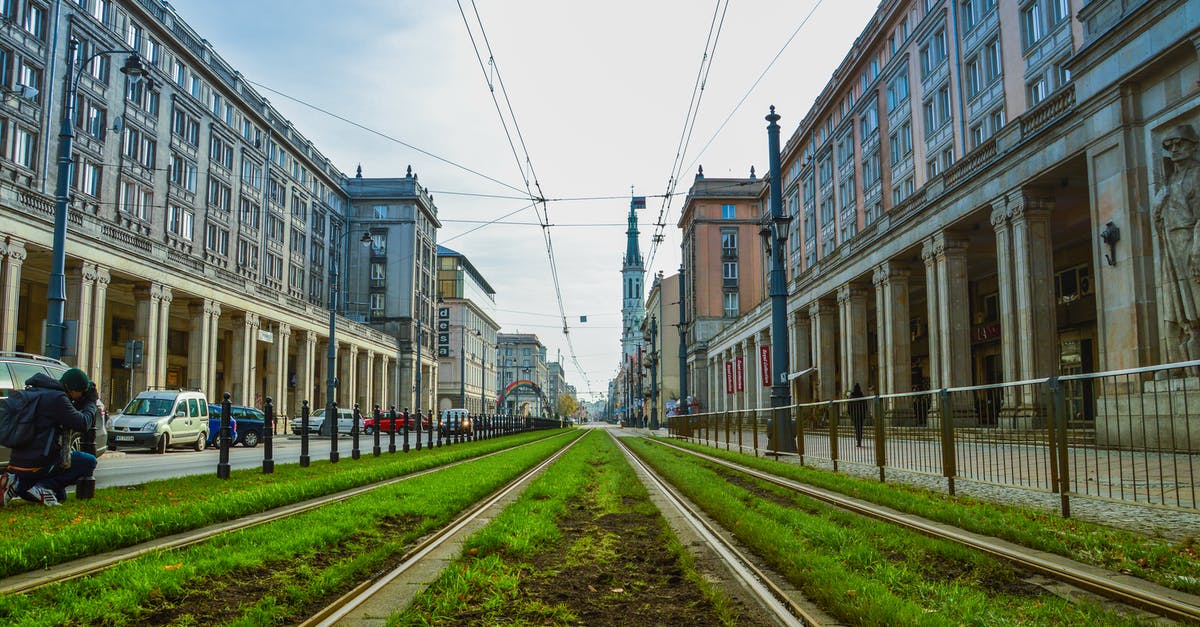 Is there a tram-only track similar to railtracks? - Green Grass Between Concrete Buildings