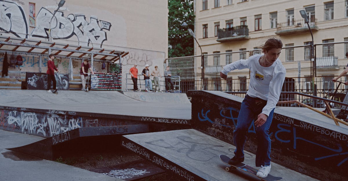 Is there a trick to jumping higher? - Man Skateboarding on the Skatepark