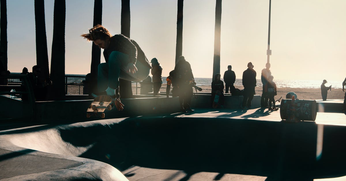 Is there a trick to jumping higher? - Group of People on Dockside