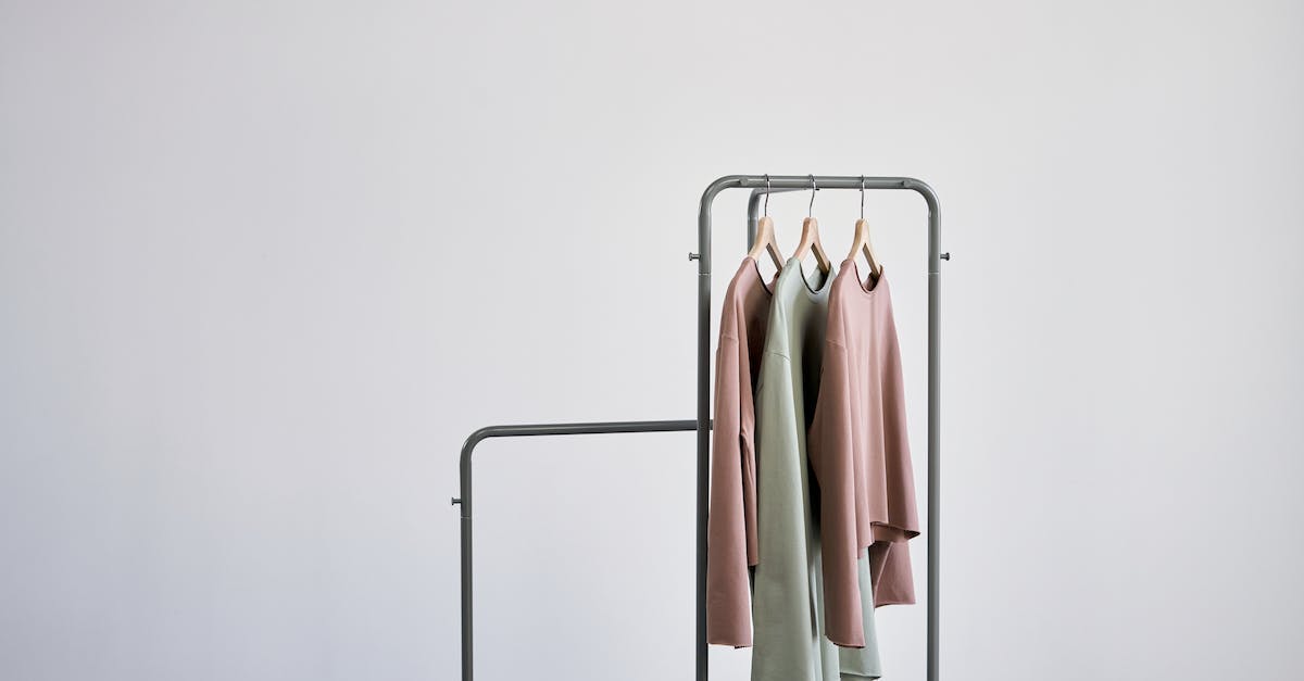 Is there a wall level that archers can't shoot over? - White and Brown Clothes Hanging on Gray Metal Rack Is there a wall level that archers can't shoot over? - White and Brown Clothes Hanging on Gray Metal Rack
