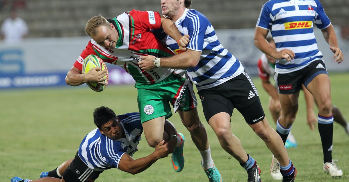 Is there a way to automatically download all match replays for a specific tournament? - Man in Blue and White Striped Soccer Jersey Playing Rugby
