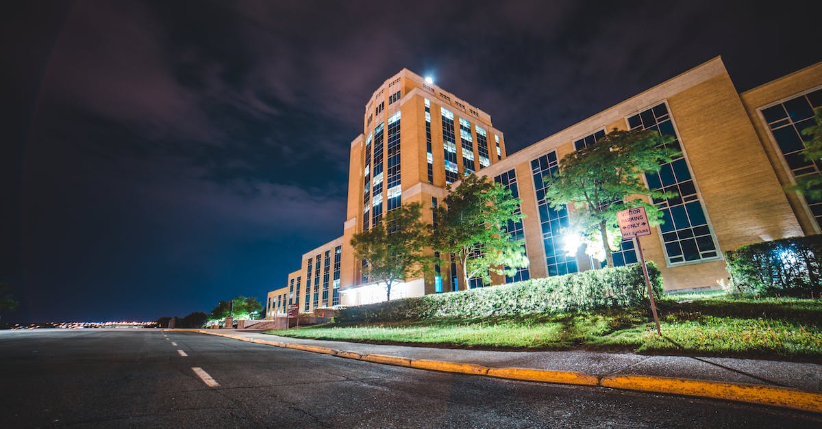 Is there a way to block nudity? - Tall cascade building near paved road at night Is there a way to block nudity? - Tall cascade building near paved road at night
