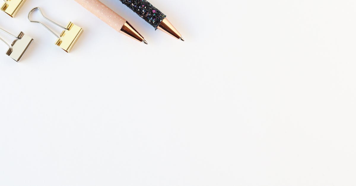 Is there a way to hack on The Gold Mine on a school chromebook? [closed] - Top view of various brilliant pens and golden binder clips on straight white surface