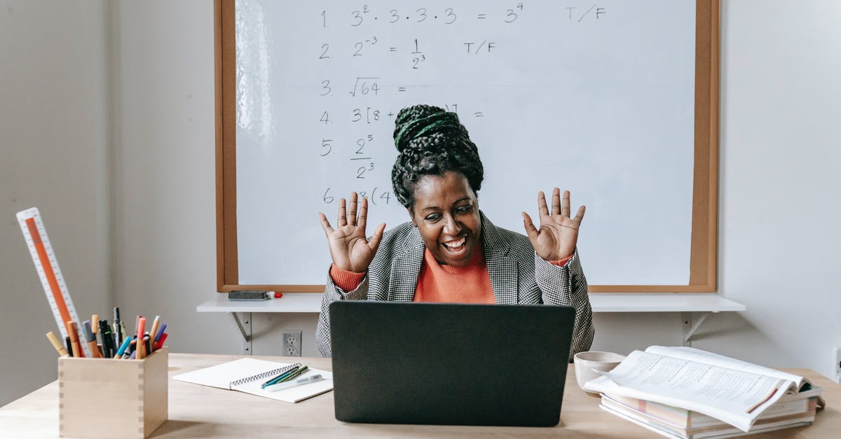 Is there a way to increase the amount of experience using a spell earns? - Happy black woman using laptop for online work Is there a way to increase the amount of experience using a spell earns? - Happy black woman using laptop for online work