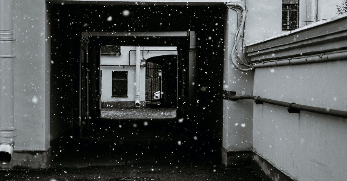 Is there a way to make a block placeable on any block in adventure mode? - Walkway of shabby residential building in snowy day