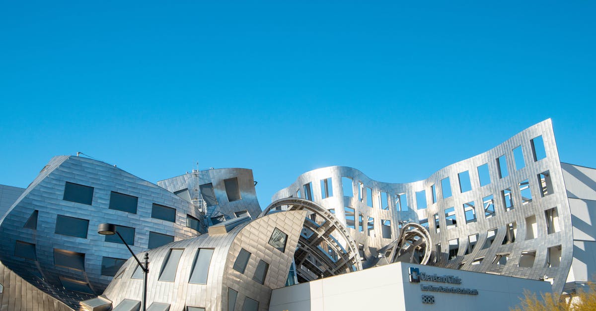 Is there a way to make a piston push any block in front of it, when that block is placed? - Contemporary quaint building of Lou Ruvo Center exterior with creative bendy walls on sunny day