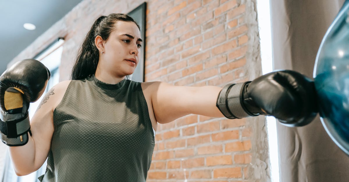 Is there a way to move Pokemon from a ROM to a Physical cartridge? - Focused female practicing boxing in club Is there a way to move Pokemon from a ROM to a Physical cartridge? - Focused female practicing boxing in club
