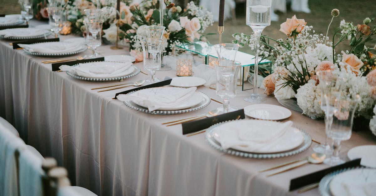 Is there a way to pick up glass after placing it? [duplicate] - Photo Of Table Setting During Daytime