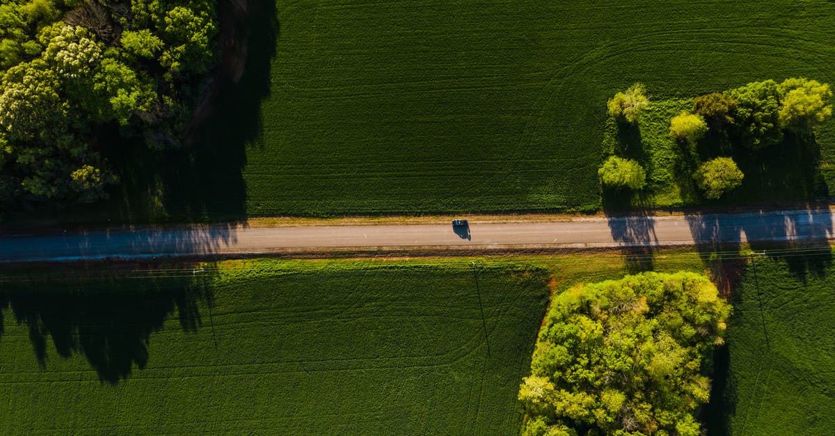 Is there a way to prevent auto-exit from Lucioball? - Car driving through green fields on sunny day
