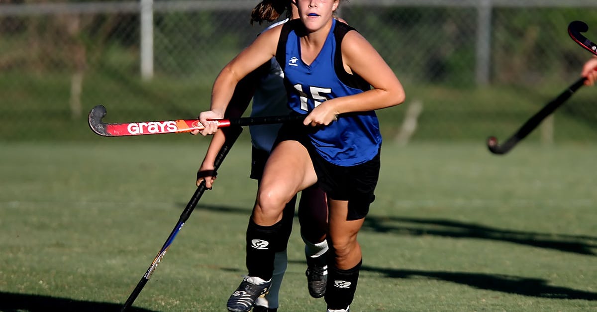 Is there a way to run a command when the player joins the SINGLEPLAYER world? - Woman Wearing Blue and Black Jersey Holding Field Hockey