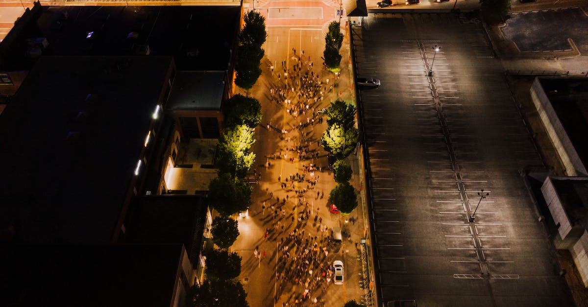 Is there a way to see where Chunks meet? - Drone view of people going along blocked road in illuminated city at nighttime Is there a way to see where Chunks meet? - Drone view of people going along blocked road in illuminated city at nighttime