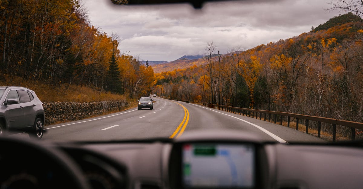 Is there a way to tell if I already got my First Win of the Day bonus? - Car riding on highway through autumn forest