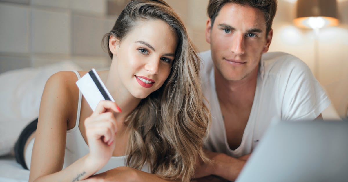 Is there a way to use an upgraded animation for a hero without buying it? - Happy young couple doing purchase on Internet together at home