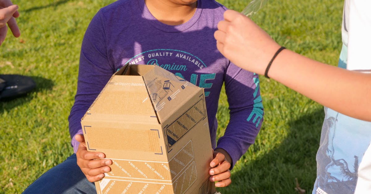 Is there an advantage to playing as Deprived? - Man in Blue Crew Neck T-shirt Holding Brown Cardboard Box
