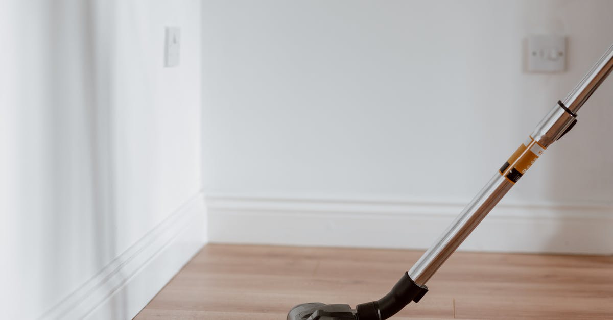 Is there an automatic level adjustment for bosses? - Modern vacuum cleaner washing floor in flat Is there an automatic level adjustment for bosses? - Modern vacuum cleaner washing floor in flat