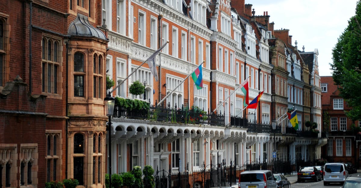 Is there an easier way to locate the vehicles Simeon wants? - Aged building with red brick facade of residence Is there an easier way to locate the vehicles Simeon wants? - Aged building with red brick facade of residence