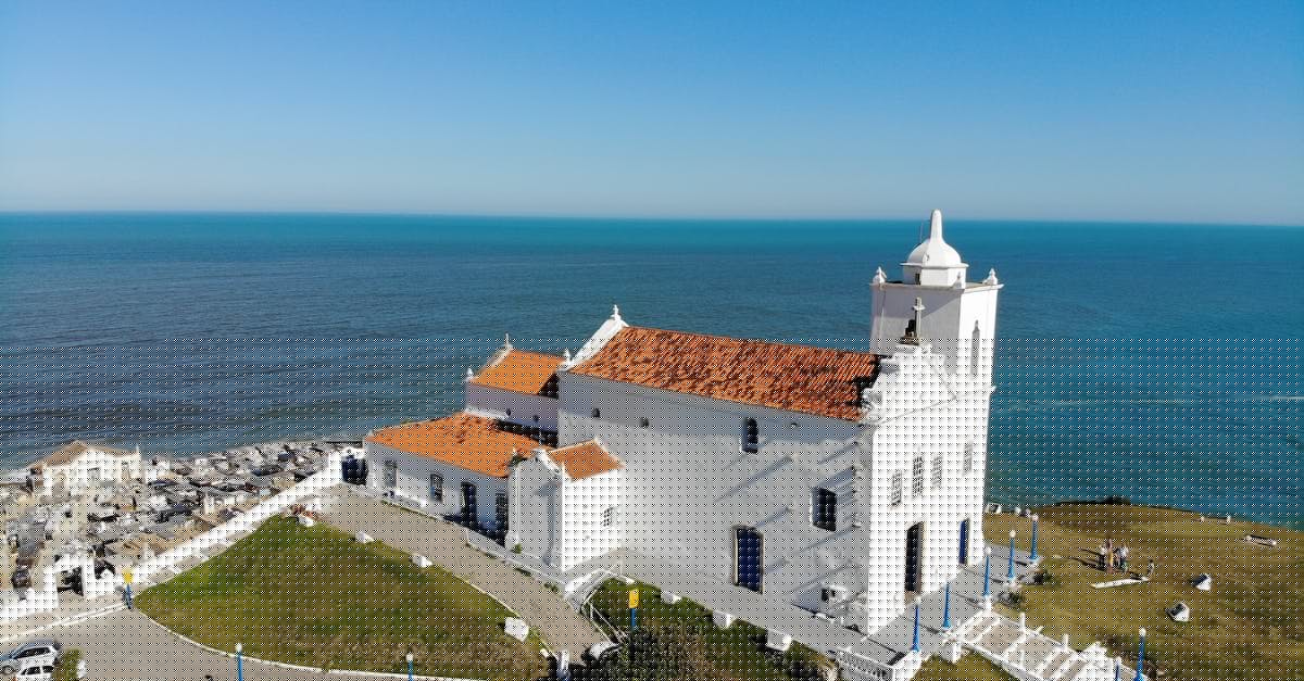 Is there an overall view of your cities? - Woman on Rock Platform Viewing City
