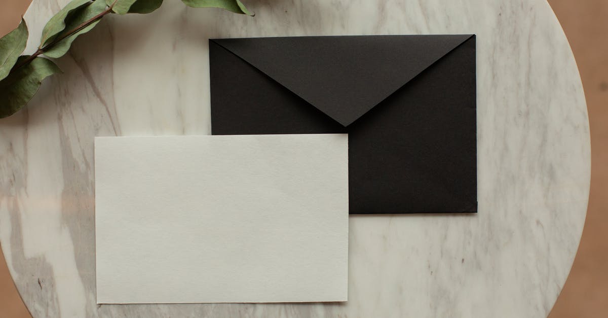 Is there an overview about the different rewards for the Card Mastery feature in Clash Royale? - Top view of blank black envelope with white card placed on table with pencil and dry green sprig in modern room Is there an overview about the different rewards for the Card Mastery feature in Clash Royale? - Top view of blank black envelope with white card placed on table with pencil and dry green sprig in modern room