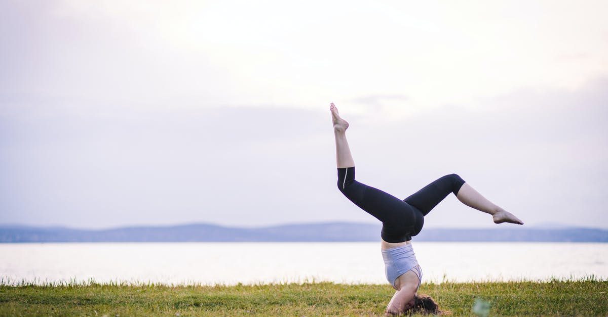 Is there any benefit of stretching out the kill shot? - Free stock photo of acro yoga, advanced yoga poses, balance