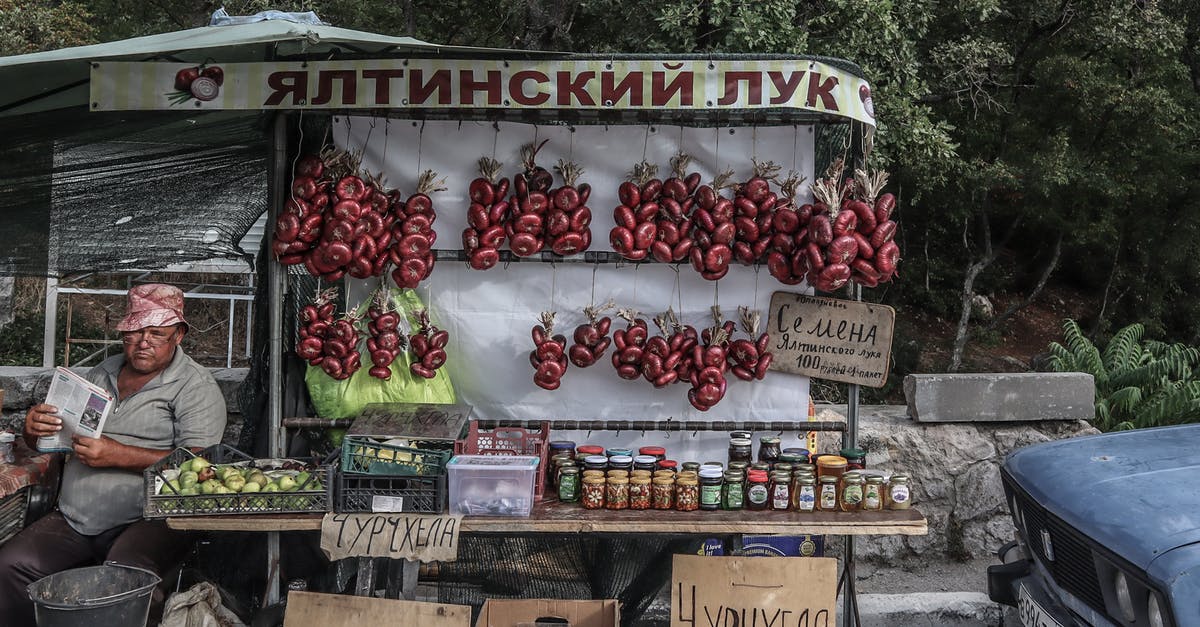 Is there any disadvantage to selling a Bobblehead or a magazine in Fallout 4? - A Man Wearing a Bucket Hat Holding a Magazine