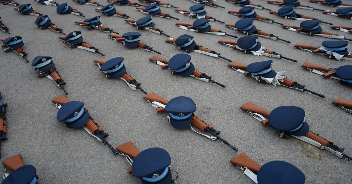 Is there any paid weapon DLC in Killing Floor 2? - Photo of Blue Caps and Rifles on Floor Is there any paid weapon DLC in Killing Floor 2? - Photo of Blue Caps and Rifles on Floor