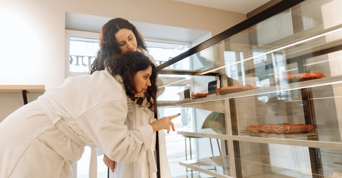 Is there any point in buying the shack next to Onett? - A Woman Wearing White Robe Choosing Food on a Glass Cabinet