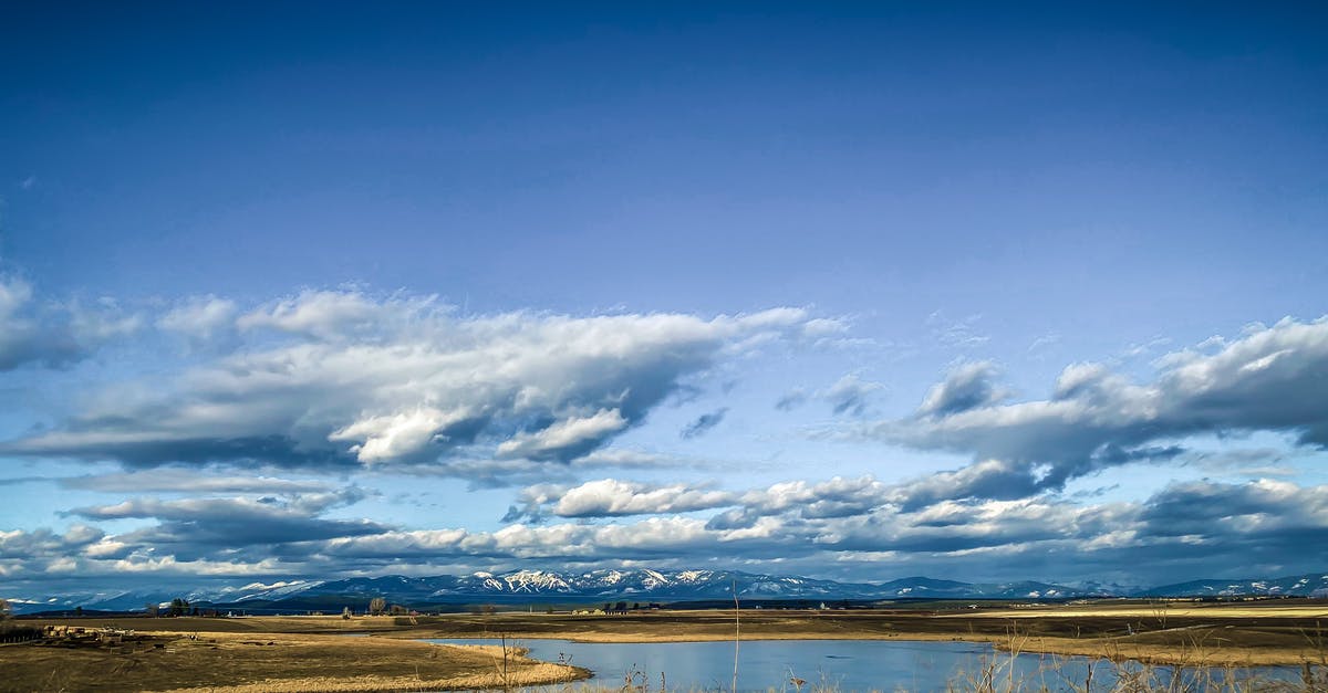 Is there any purpose to Barren planets? - Green Grass Field Near Body of Water Under Blue Sky Is there any purpose to Barren planets? - Green Grass Field Near Body of Water Under Blue Sky