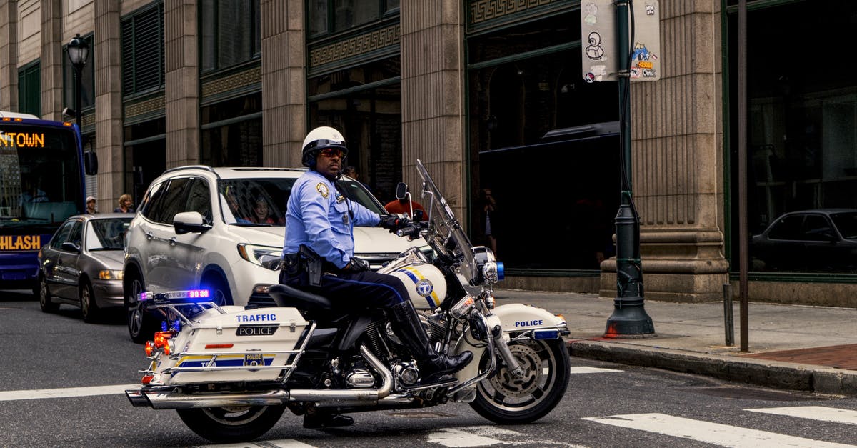 Is there any reason not to use the police siren during driving segments? - Photo of Man Riding Motorcycle