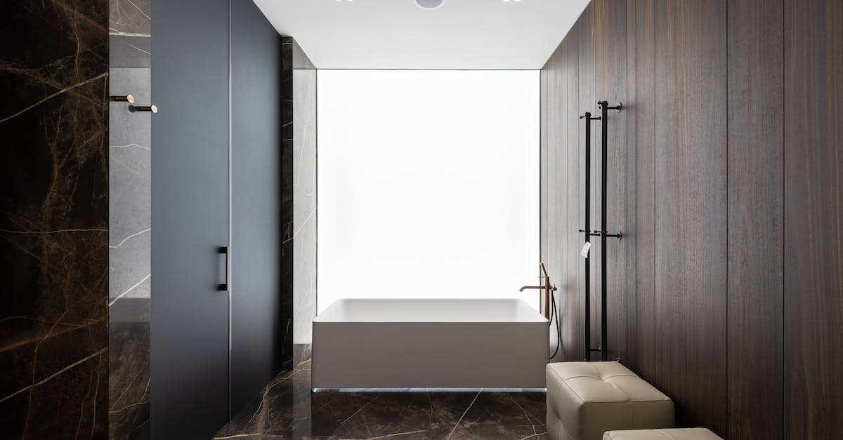 Is there any reason to place more expensive Smurf houses? - Spacious bathroom interior design with leather poufs Is there any reason to place more expensive Smurf houses? - Spacious bathroom interior design with leather poufs