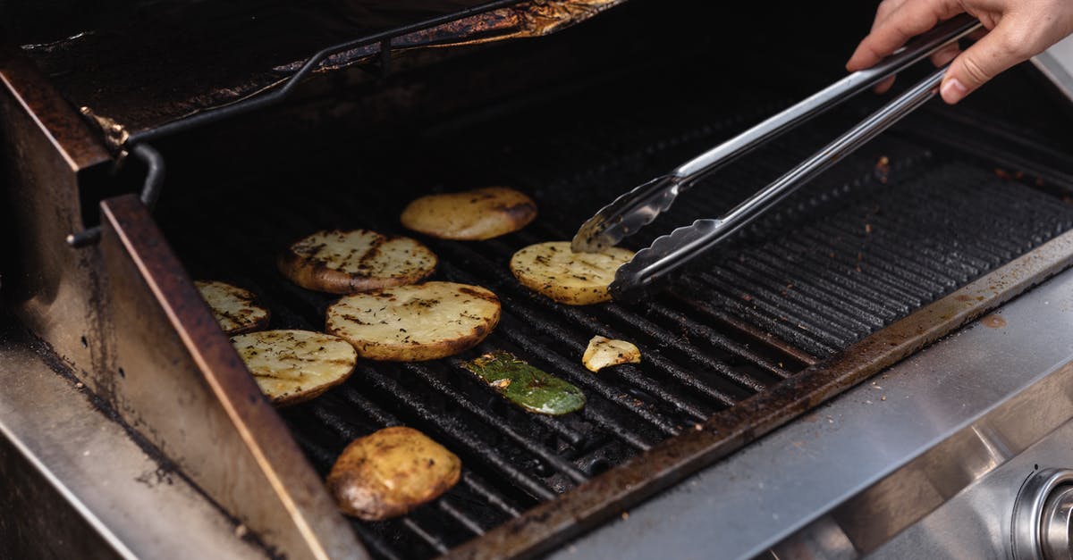 Is there any reason to turn off auto-equip? - Unrecognizable man with tongs turning over tasty cut potatoes on metal grate while cooking on modern hot barbecue grill machine Is there any reason to turn off auto-equip? - Unrecognizable man with tongs turning over tasty cut potatoes on metal grate while cooking on modern hot barbecue grill machine
