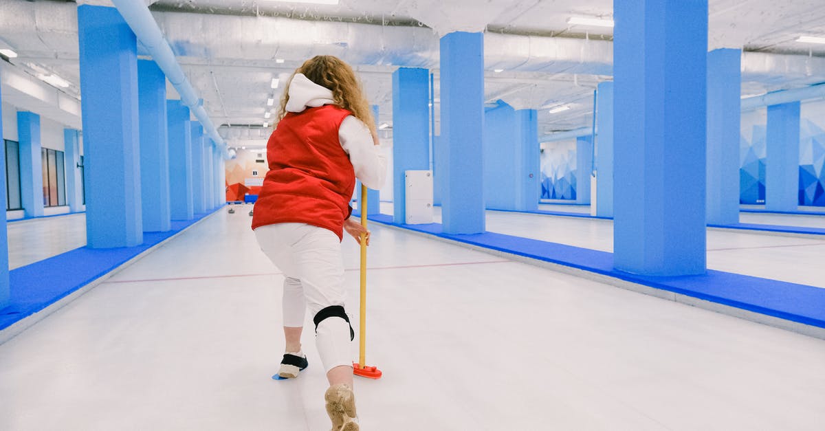 Is there any use to the slide bounce/kick move? - Active woman playing curling on ice rink Is there any use to the slide bounce/kick move? - Active woman playing curling on ice rink