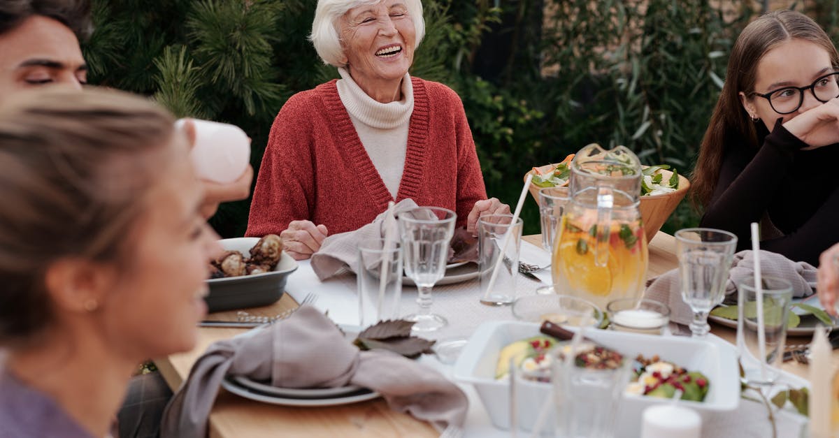 Is there any value in leaving Tubbs to enjoy his meal after he ate it? - Smiling elderly woman with family and friends enjoying dinner at table backyard garden Is there any value in leaving Tubbs to enjoy his meal after he ate it? - Smiling elderly woman with family and friends enjoying dinner at table backyard garden