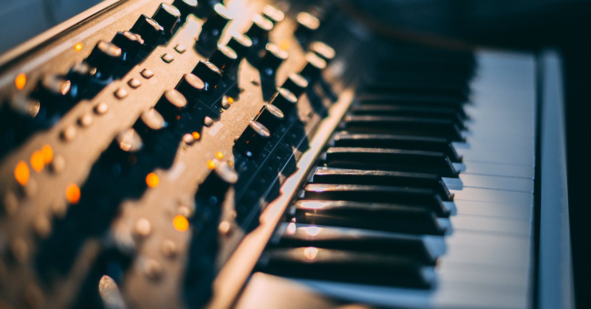 Is there any way I can do key combos on a steam controller (mac) - Close-Up Photo Of Electronic Keyboard