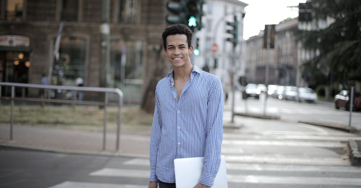 Is there any way to get returning player content on PC without previously playing? - Positive ethnic guy in shirt holding laptop and smiling at camera while standing on city pedestrian crosswalk in city center Is there any way to get returning player content on PC without previously playing? - Positive ethnic guy in shirt holding laptop and smiling at camera while standing on city pedestrian crosswalk in city center