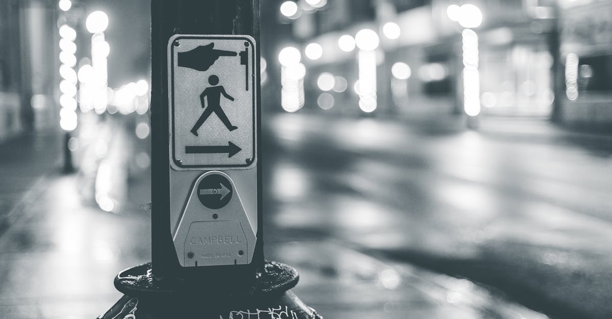 Is there any way to get rid of the 'infinity' button in Cookie Clicker? - Pedestrian crosswalk button placed near roadway in city in evening time