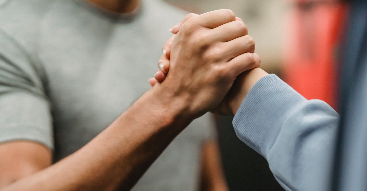 Is there any way to help a Power do tasks that isn't your power? - Crop sportive couple clasping hands in gym Is there any way to help a Power do tasks that isn't your power? - Crop sportive couple clasping hands in gym
