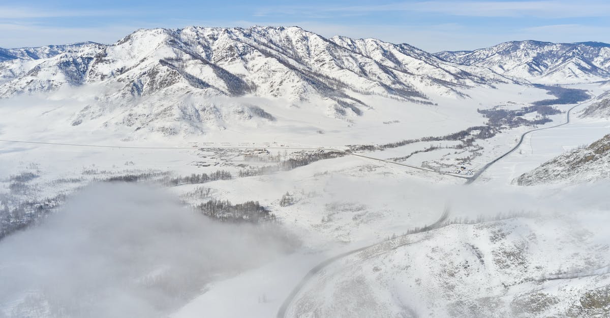 Is there any way to keep my minecraft server from going through the day/night cycle when no one's online? - Snowy road and river in valley among mountains in winter Is there any way to keep my minecraft server from going through the day/night cycle when no one's online? - Snowy road and river in valley among mountains in winter