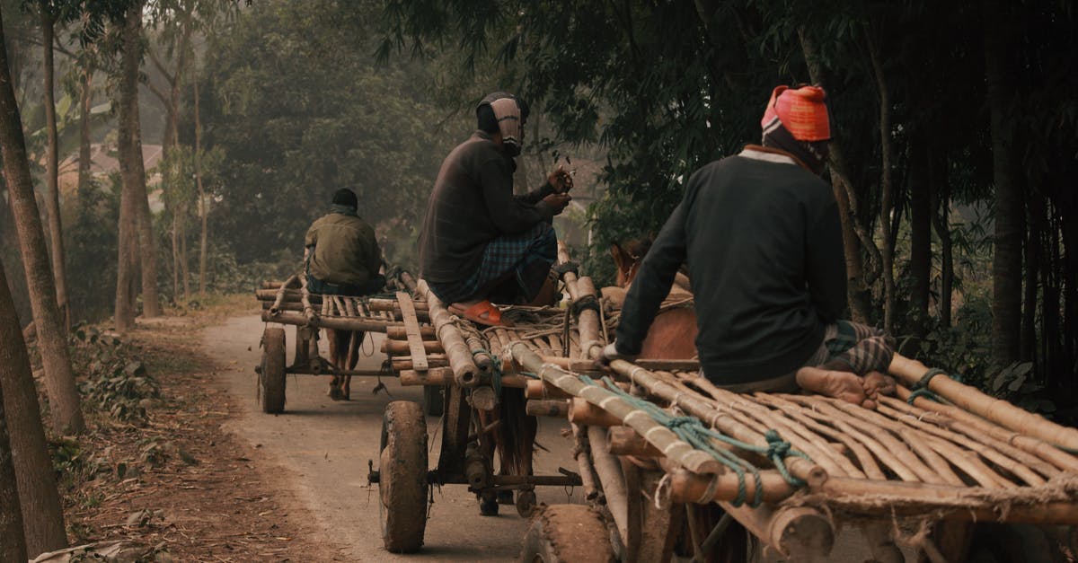 Is there any way to make withdrawn country come back? [duplicate] - Ethnic men moving on bamboo cart fixed on horses