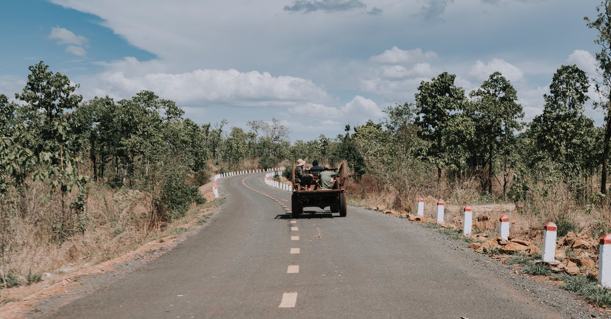 Is there any way to make withdrawn country come back? [duplicate] - Car driving along road in summer countryside