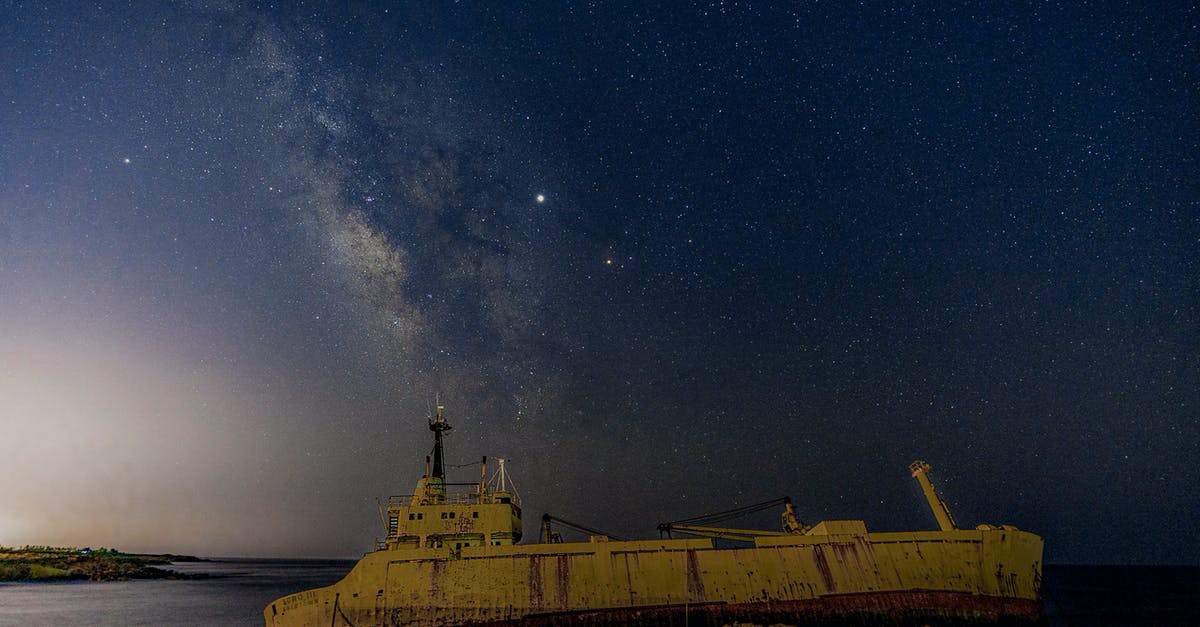 Is there any way to play Star Wars: The Old Republic on Mac? - Old ship floating in ocean under sky with stars at night sky