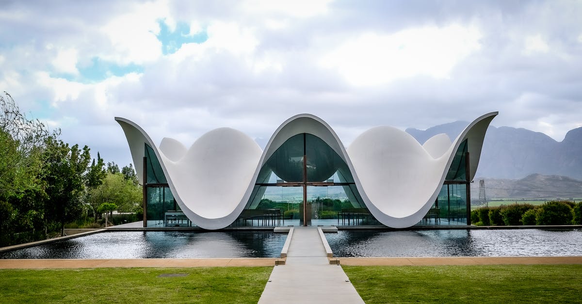 Is there any way to revive my Sim? - A Modern Building Near the Body of Water Under the Cloudy Sky Is there any way to revive my Sim? - A Modern Building Near the Body of Water Under the Cloudy Sky