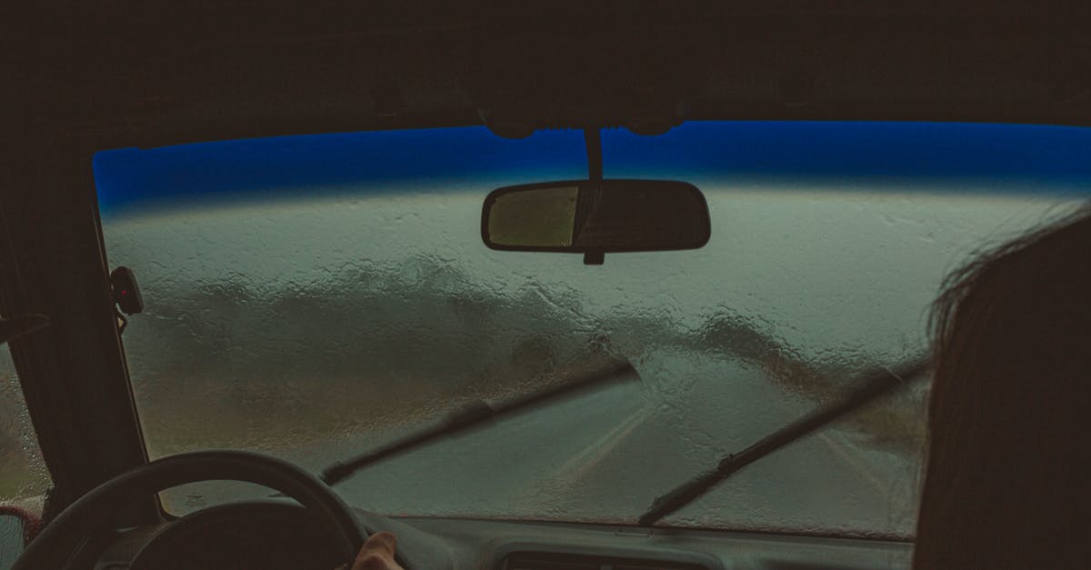 Is there any way to speed up processing of materials? - Crop unrecognizable travelers sitting in automobile with wet windshield and wipers in rainy weather Is there any way to speed up processing of materials? - Crop unrecognizable travelers sitting in automobile with wet windshield and wipers in rainy weather