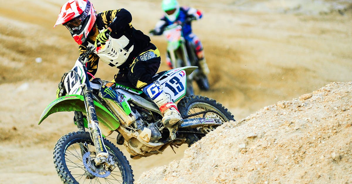 Is there any workaround for losing focus on popups? - Man Riding Motocross Dirt Bike on Terrain