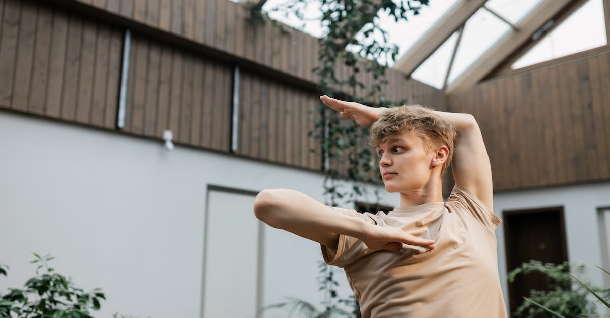 Is there anything to do except surviving in the summer - Woman in Beige Sleeveless Dress Raising Her Right Hand