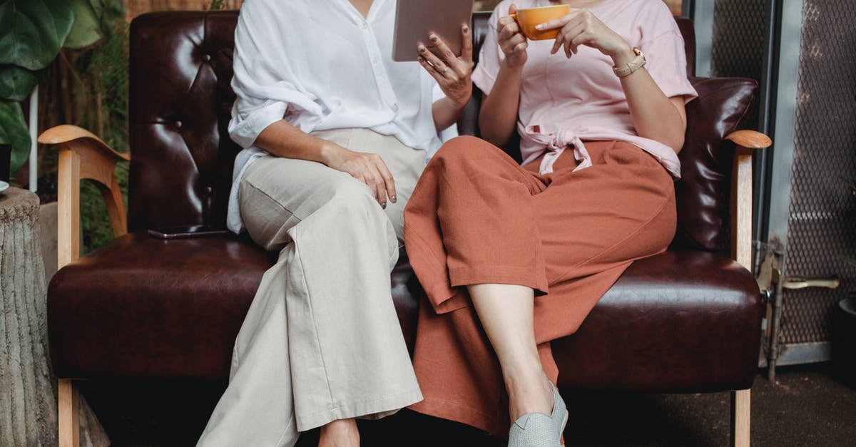 Is there anyway to dismiss a limit break and not use it? [duplicate] - Crop anonymous women in stylish clothes browsing tablet and sitting on leather couch in cafe