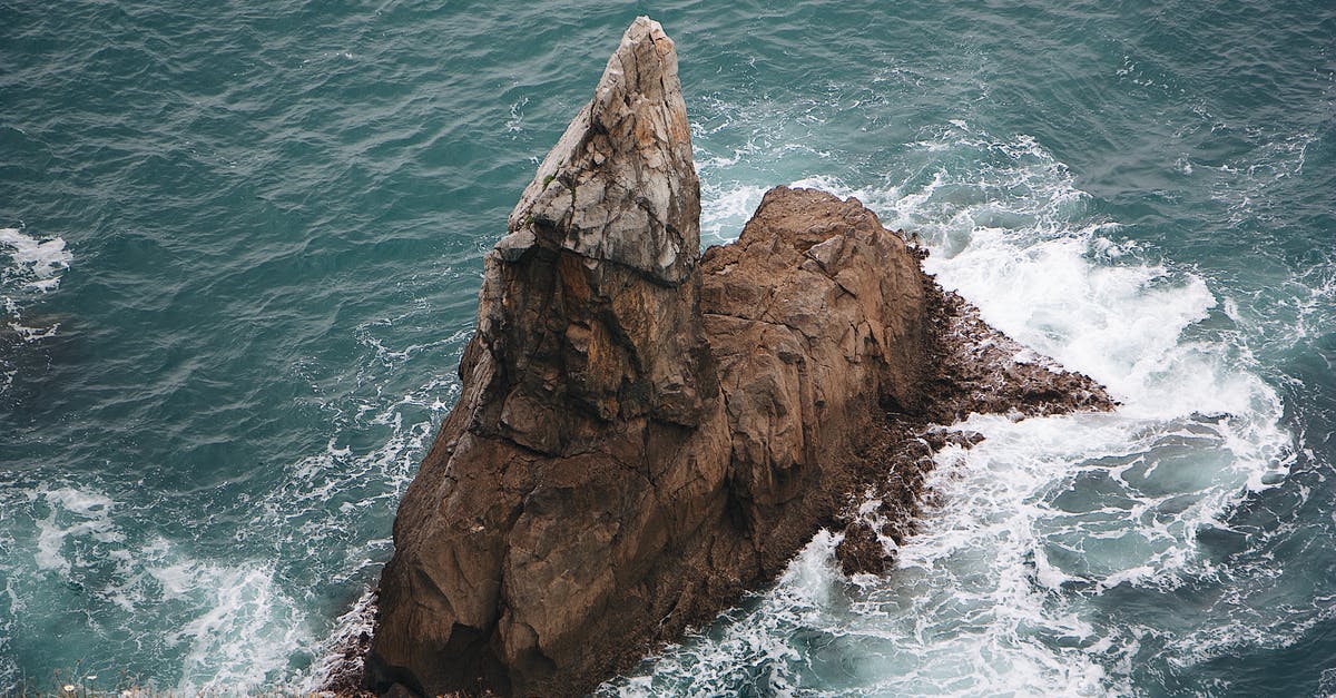 Is there attacking from the sea? - Brown Rock Formation on Sea Is there attacking from the sea? - Brown Rock Formation on Sea