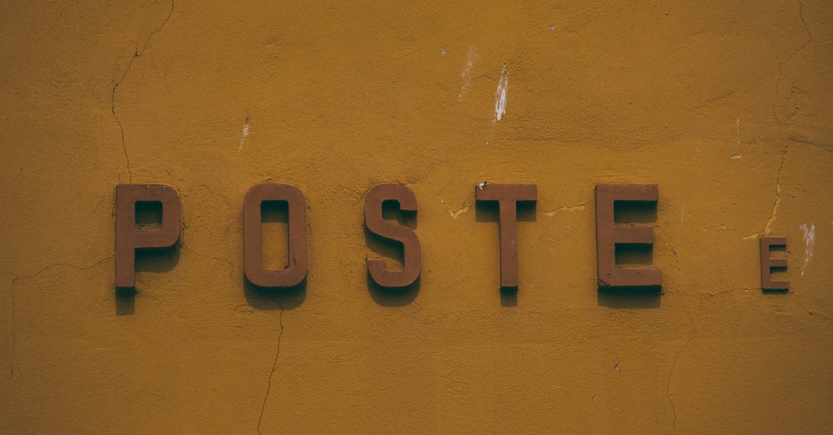 Is there locational damage in Postal 2? - Closeup of inscription of signboard on dark yellow cracked volume aged stone wall Is there locational damage in Postal 2? - Closeup of inscription of signboard on dark yellow cracked volume aged stone wall
