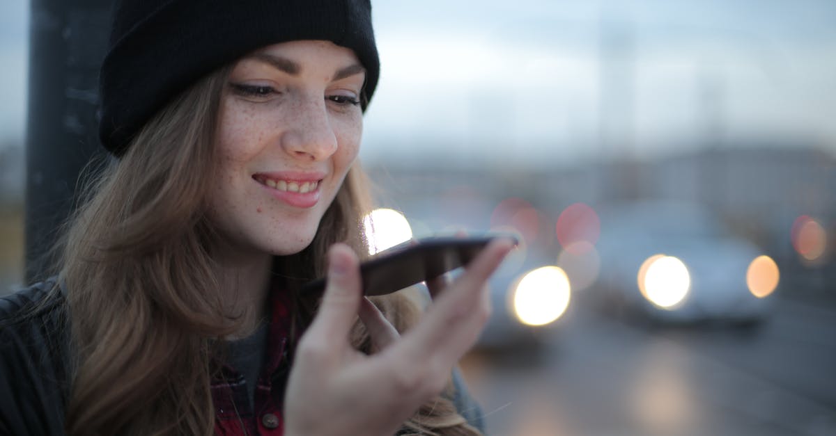 Is there mass phone call in Watch Dogs series? - Joyful young woman phoning on street in evening